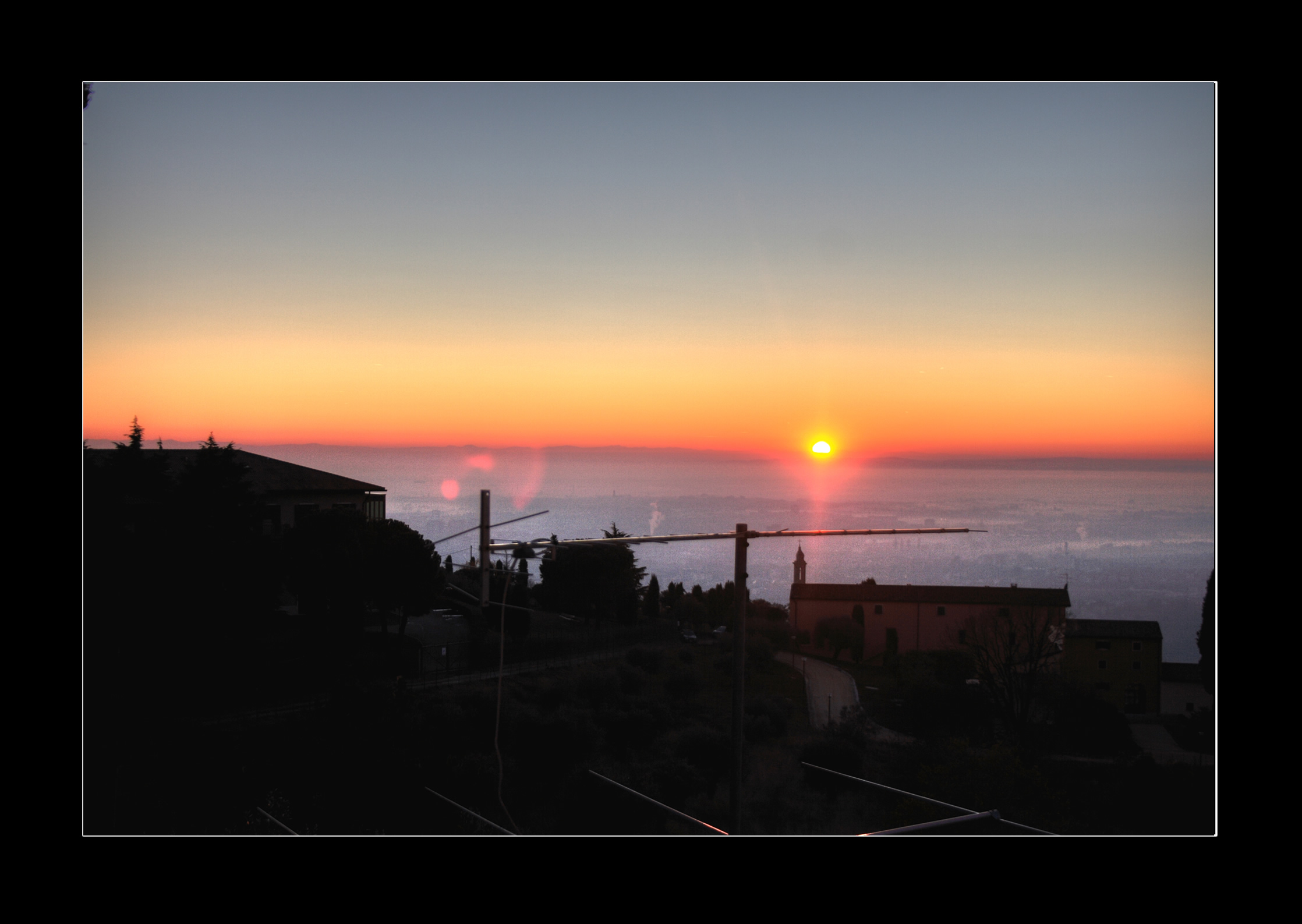 Verona Tramonto Nebbia Nebbia sulla città con il sole che tramonta